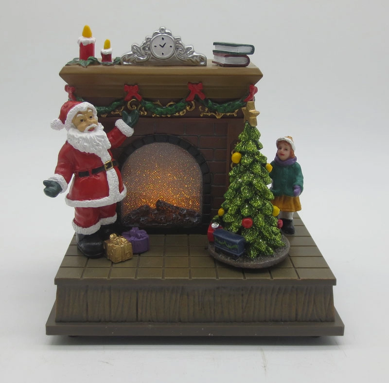 動くクリスマスツリーが付いているLEDのクリスマスのサンタの暖炉