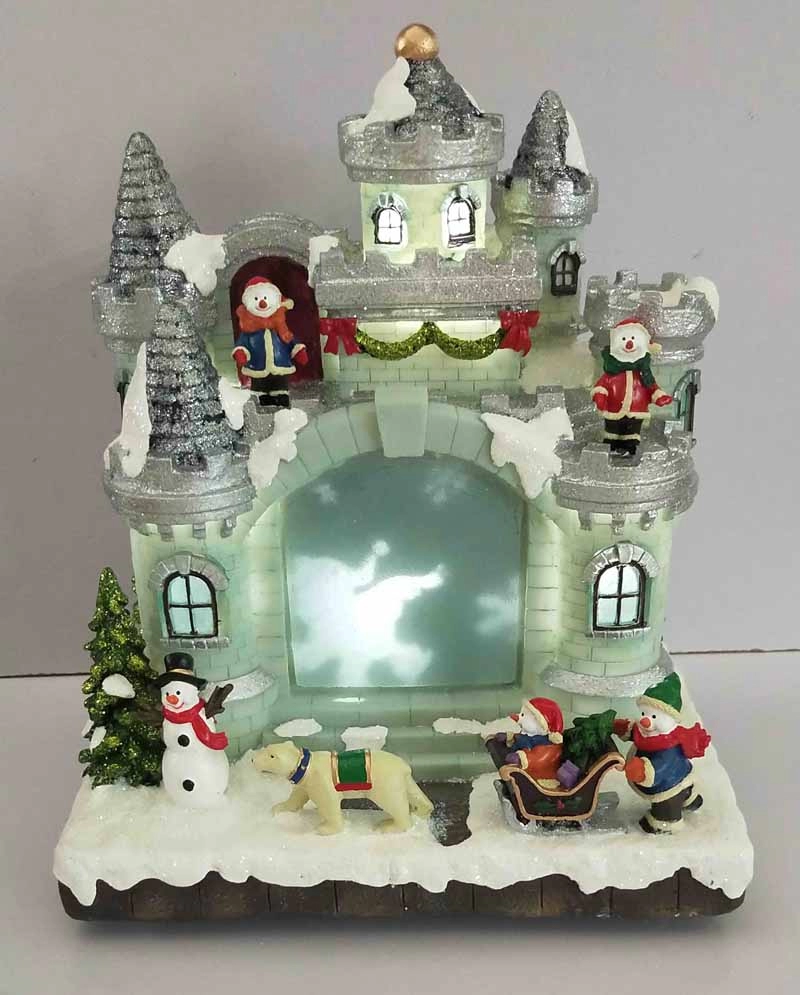 LEDクリスマス雪だるまの城と雪だるまが城の周りを走り回っています