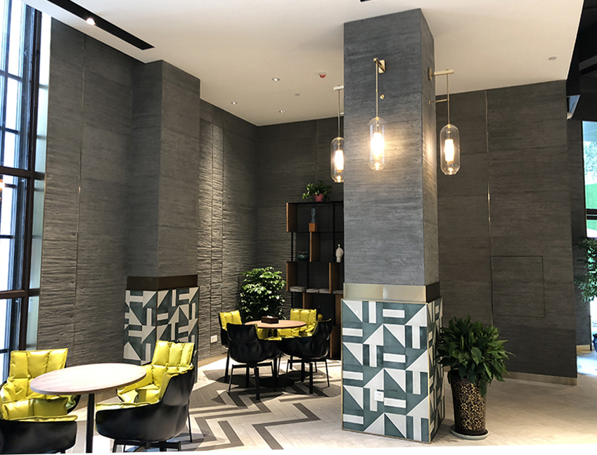 Faux concrete cladding panel for contemporary hotel